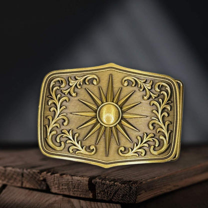 Gold belt buckle on a table with black background.