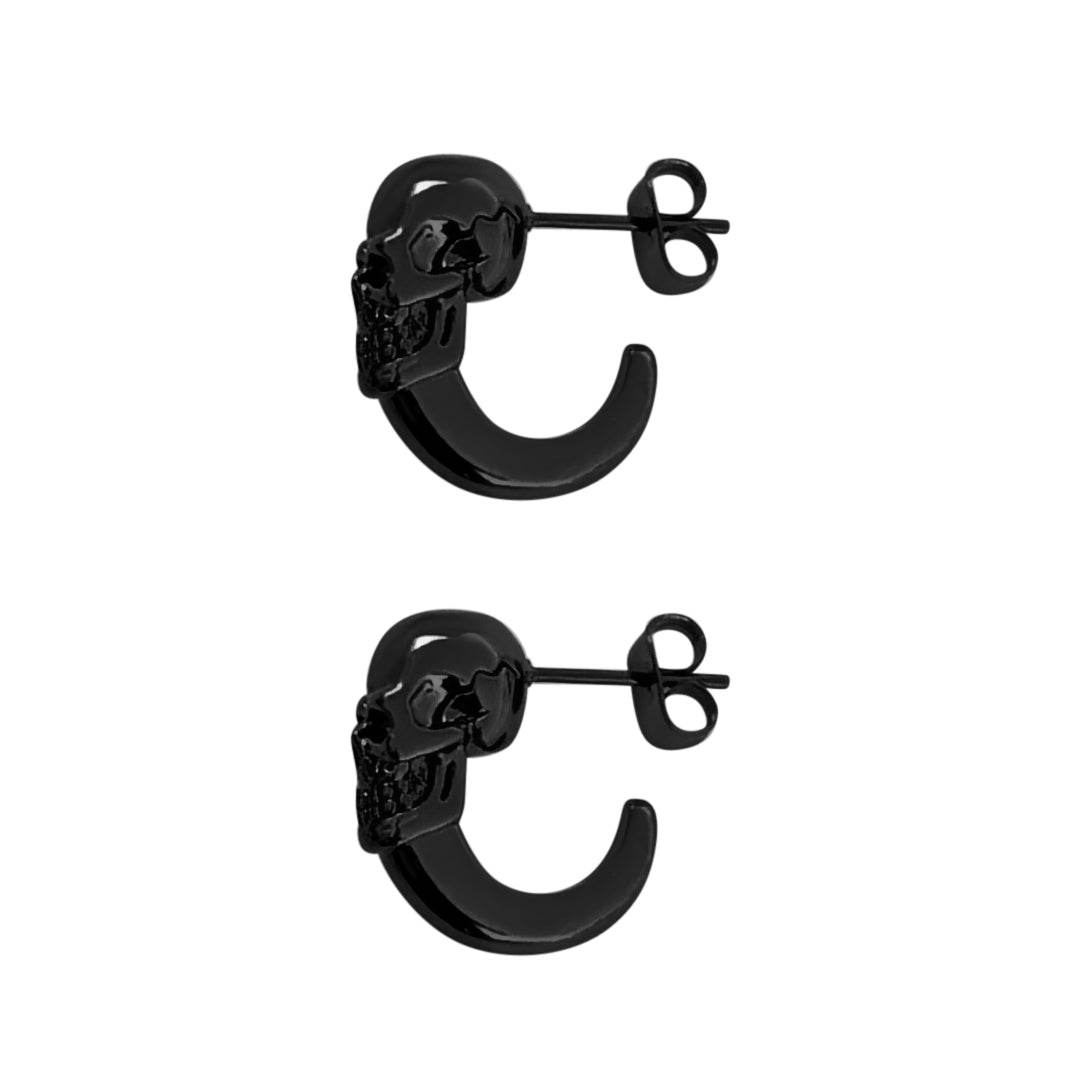 Unisex skull earrings with hoop design in stainless steel.